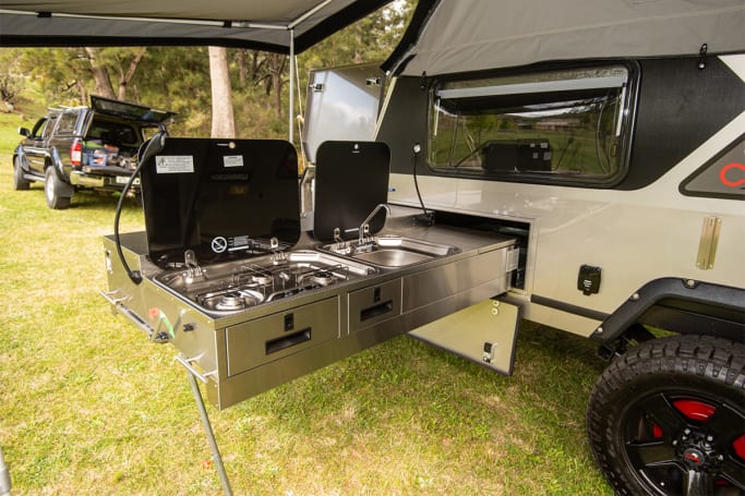 The stainless-steel kitchen is massive, with heaps of storage. (image credit: Brendan Batty)