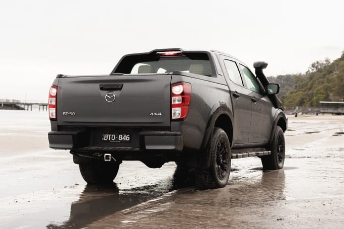 At the rear, there are vertical tail-lights and a boxy tub for the dual-cabs.