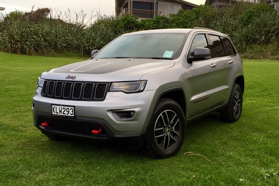 The new Trailhawk rivals the SRT for attention-seeking-but-still-functional bling, with its red tow hooks and badging. (Image credit: Richard Berry)