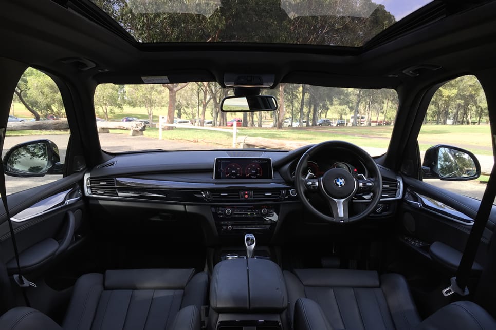 That large screen, the virtual instrument cluster, the familiar BMW slab-like dashboard, and the luxurious seating add up to a prestigious cockpit worthy of a primo SUV. (image: Richard Berry)