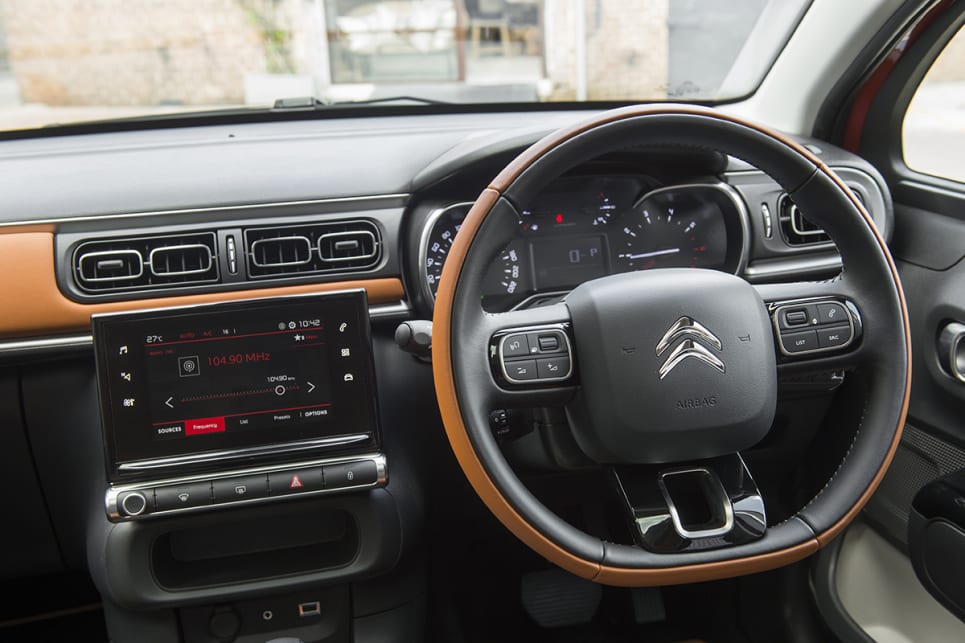 The Colorado Hype interior includes judicious use of a burnt orange leather on the steering wheel.