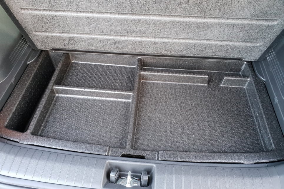 Underneath the Kona's boot lies a small parcel shelf for thinner items.