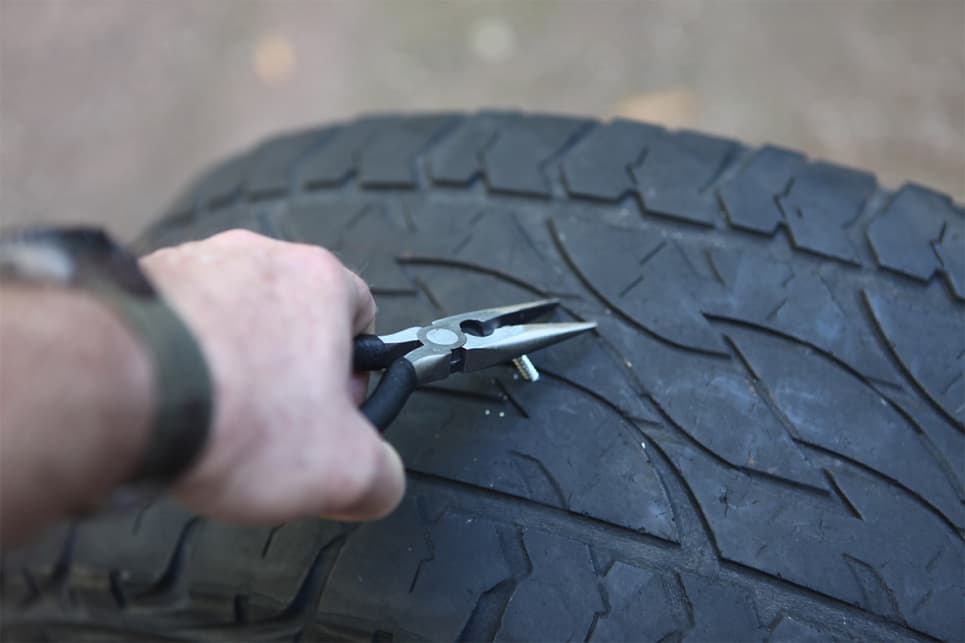 Find the puncture hole, get the offending object (stick etc) out of the hole with a pair of pliers.