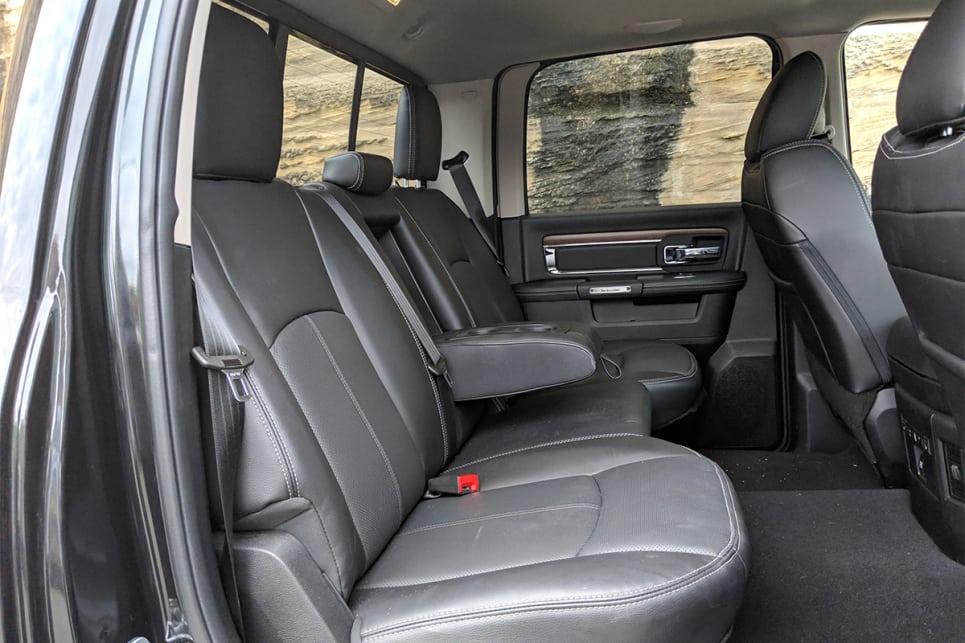 The backseat easily fits three large adults with inches of head and legroom to spare.
