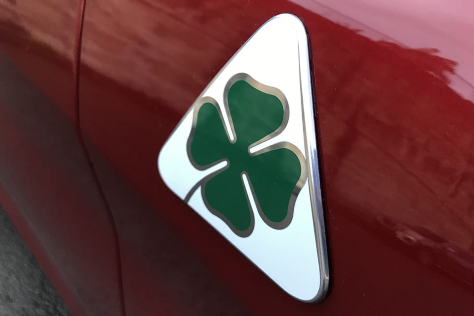 The iconic Quadrifoglio (four-leaf clover) badge.