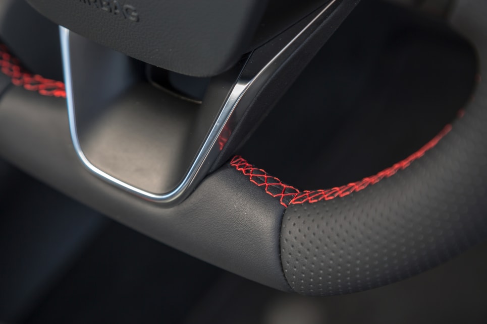 ST-Line grades also get a flat-bottomed steering wheel with red accent stitching. (ST-Line variant pictured)