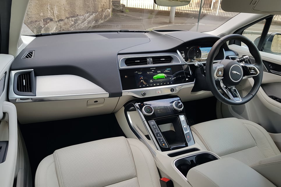 The inside is contemporary Jaguar, with surfaces and textures more aligned with the recent E-Pace.