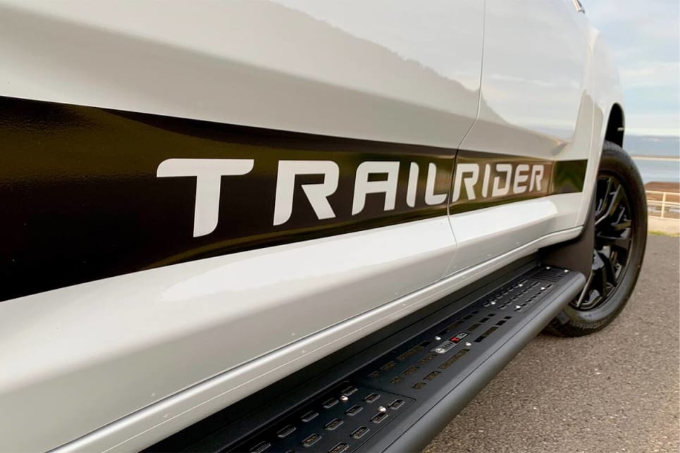 Trailrider decals line the doors on each side.
