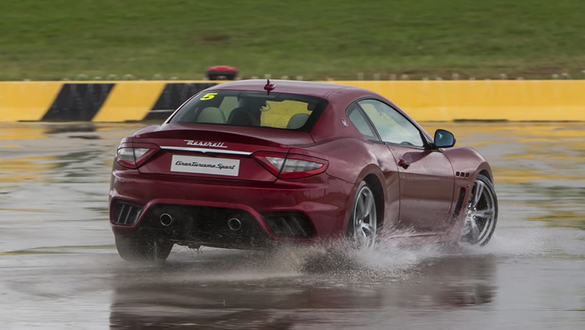 Drop it back to first though, and all 7500rpm worth of  the 4.7's old-school naturally aspirated linear power delivery makes it a joy to continually drift on the wet concrete.