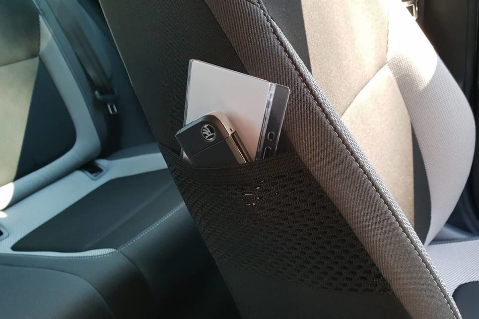 ... pockets on the inside of the front seats ...