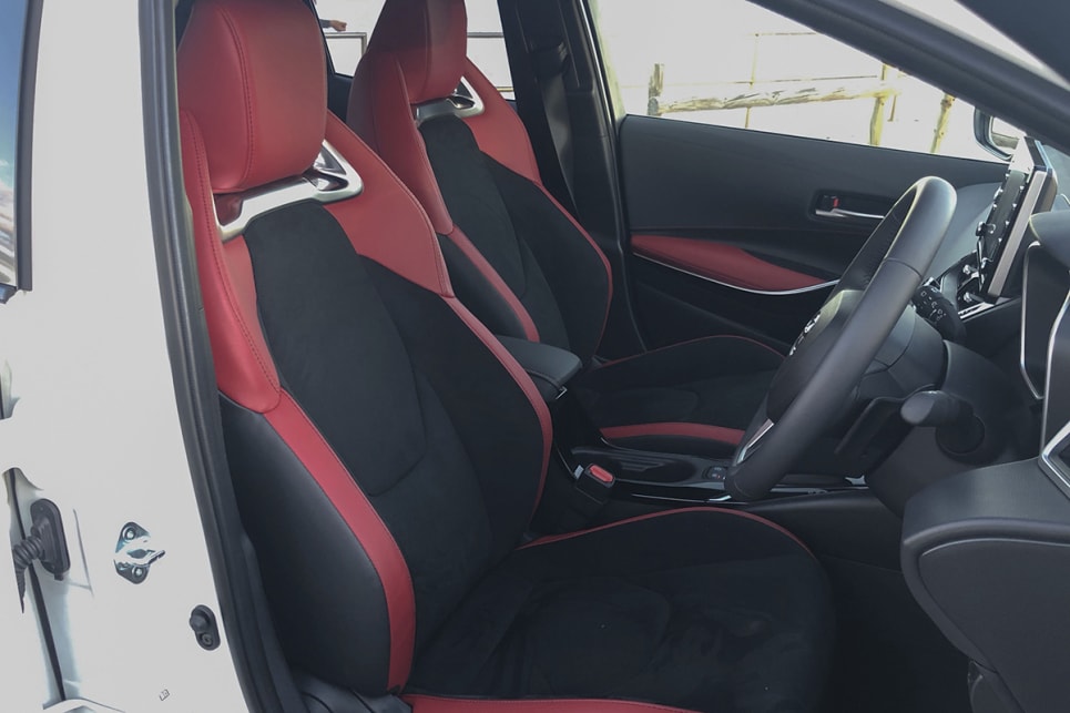 The cabin is lifted immeasurably by the excellent, racy front seats with the red inserts, Alcantara trim and metallic slots. (image: Peter Anderson)