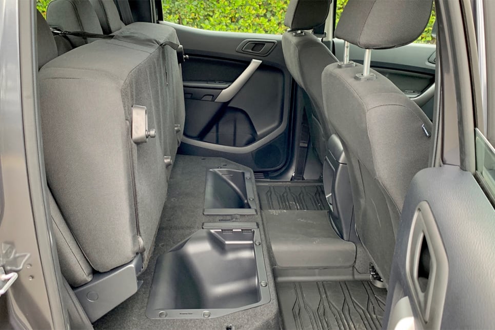 The rear seat base can be folded up to allow for additional secure dry storage.