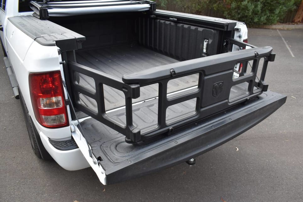 The folding frame can serve as a load divider or can be used to extend the load space.