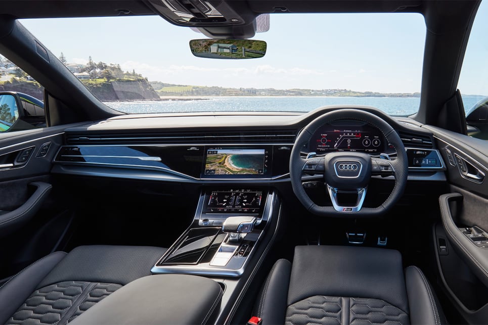 Climb into the cabin of the RS Q8 and you’re met by a wall of leather and technology.