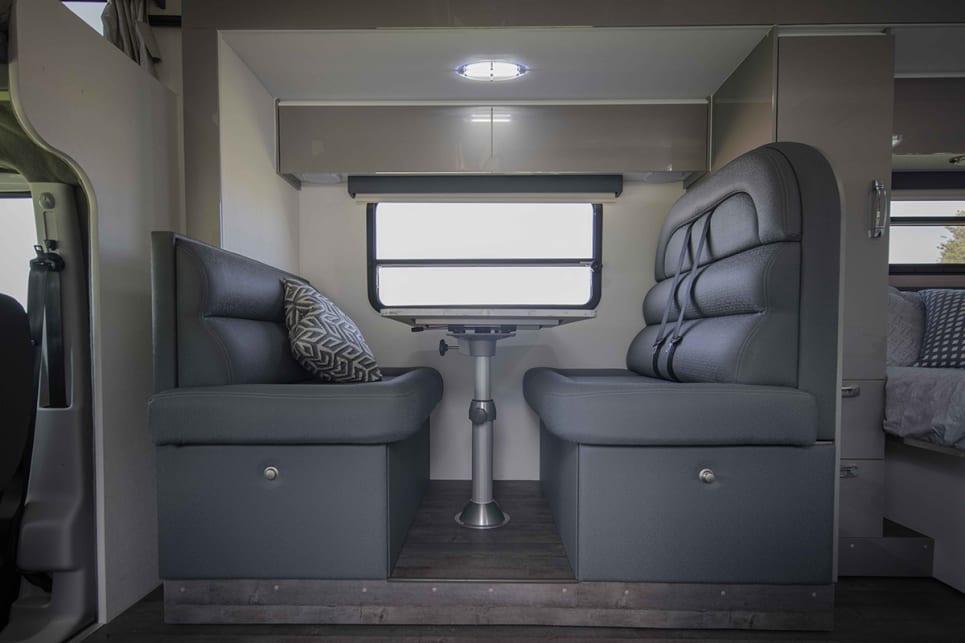 It has a fully upholstered dinette (with table and seating for four).