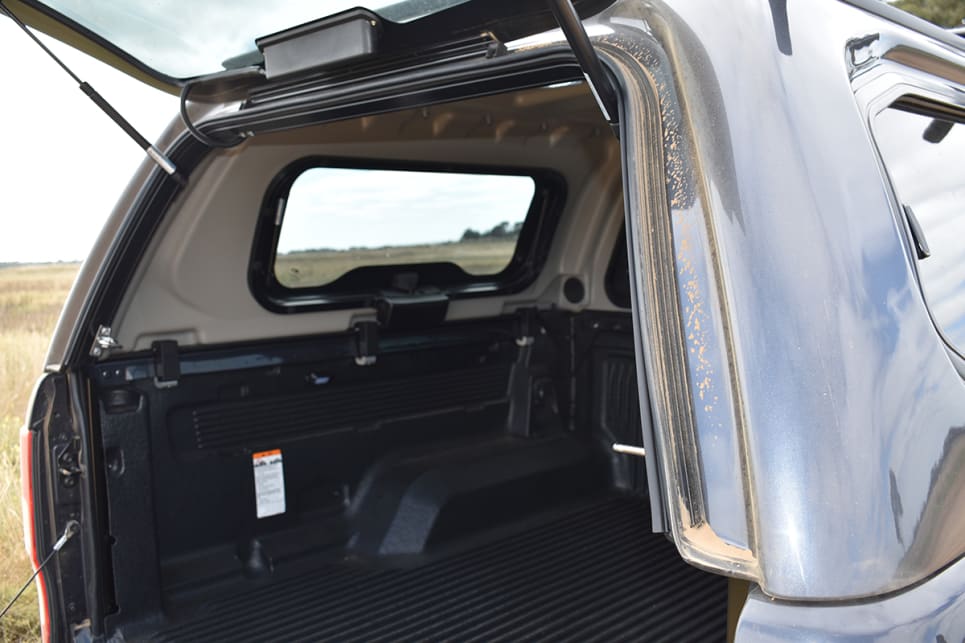 A common problem in utes fitted with canopies is dust (and water) leaking into the load area through sizeable gaps in the base and sides of the vehicle’s tailgate. (image: Mark Oastler)