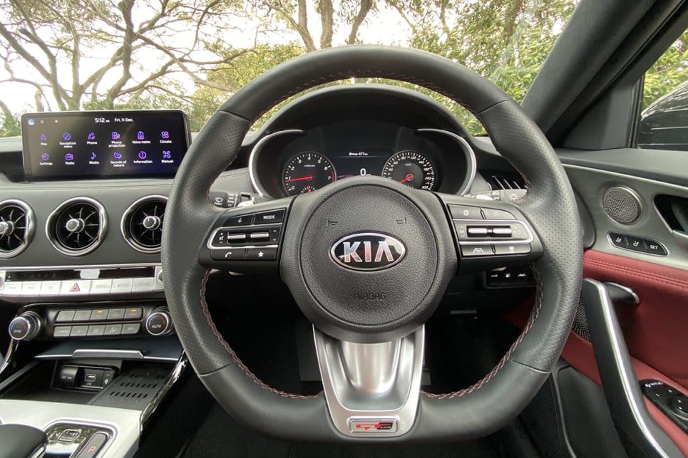 Inside is a leather flat-bottomed steering wheel.