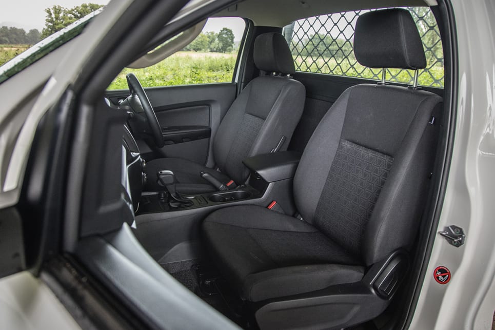 There's cloth seats, vinyl floor covering and hard plastic surfaces everywhere in the XL.