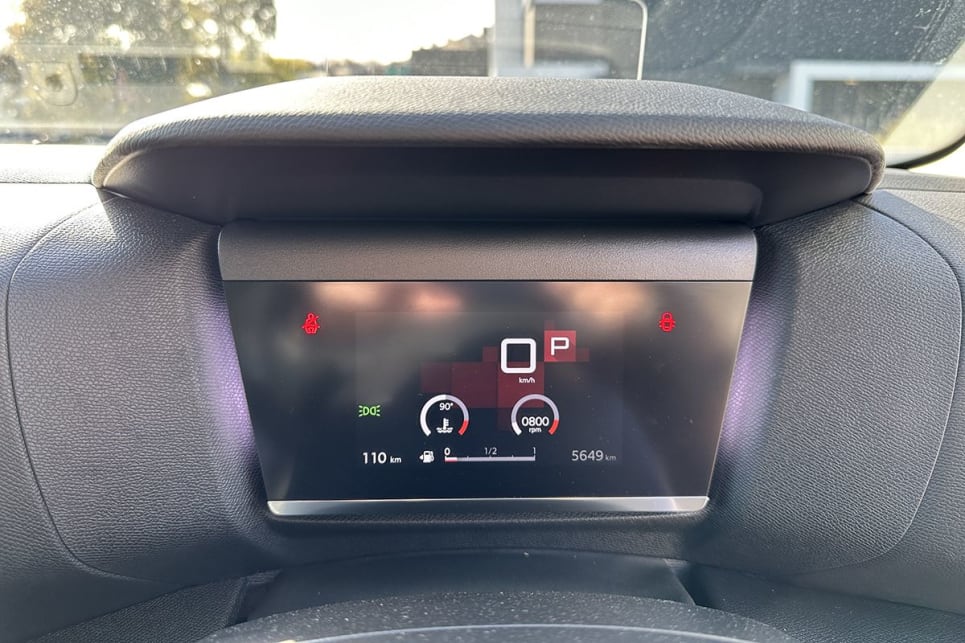 The C4’s 5.0-inch digital instrument cluster is not only undersized, but also missing the breadth of functionality. (Image: Justin Hilliard)