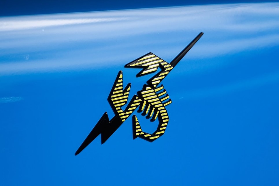 Abarth's signature scorpion logo now features a lightning bolt running through it.