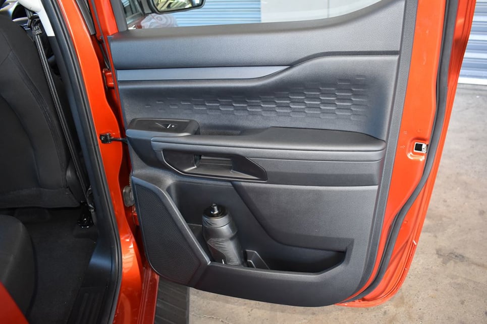 Rear seat passengers must share one storage pocket on the front passenger seat’s backrest and there’s no fold-down centre armrest or cupholders. (image: Mark Oastler)