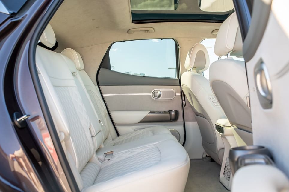 The GV60's back seat feel spacious, with plenty of width and a flat floor. (Image: Tom White)
