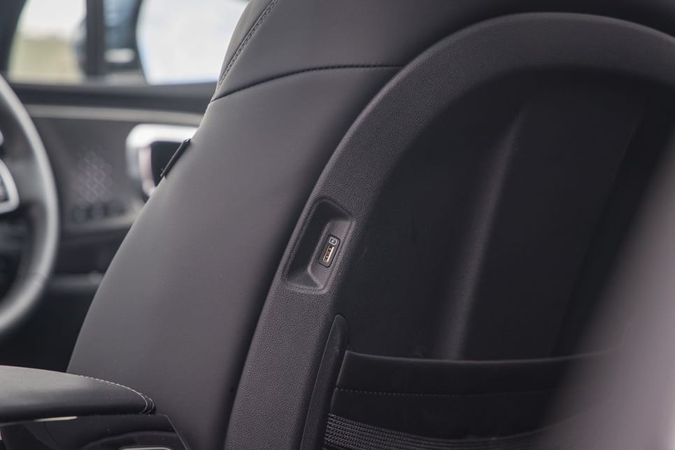 There is a USB-A port embedded in the side of each front seat. (Image: Glen Sullivan)