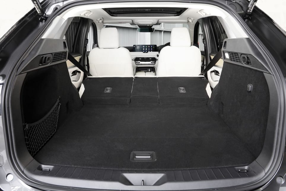 The cargo area is a bit larger than this car's CX-5 sibling. (Azami variant with Takumi package shown)