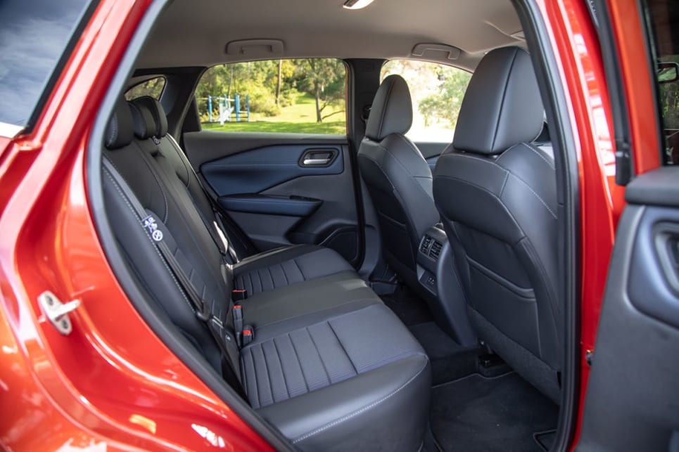 The rear seat continues the plush treatment, with soft materials on the backs of the front seats, and into the doors.