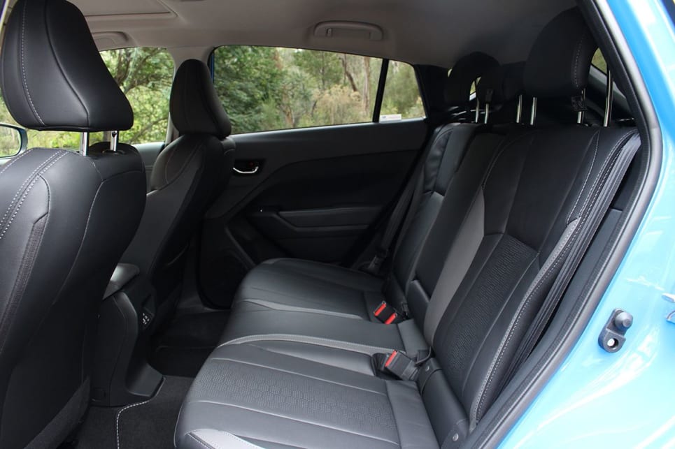 Rear passengers have access to two central cupholders in the armrest and a small space in the door. (Image: Chris Thompson)