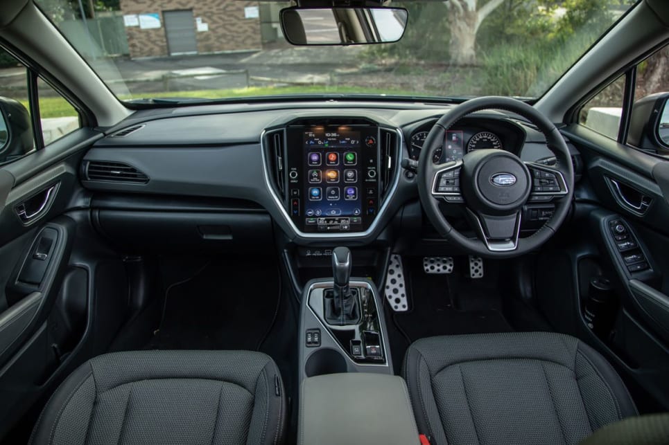 Inside it feels cosy and ready for action with its chunky steering wheel and seemingly hard-wearing cloth seat trim.