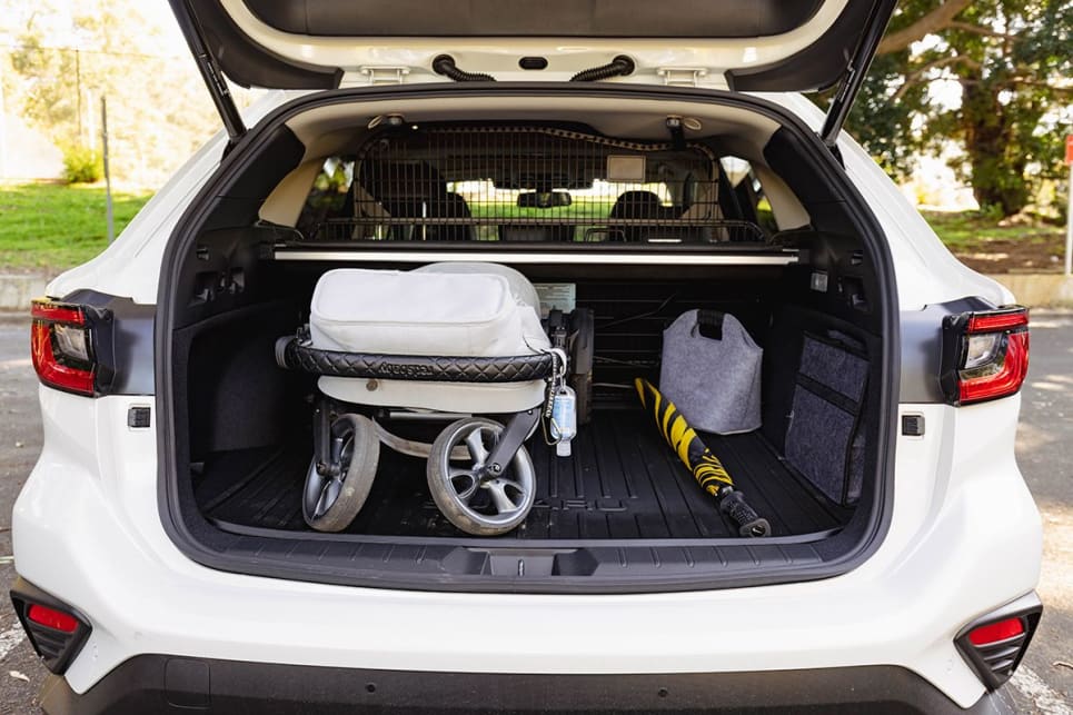 In the boot you've got handy cargo hooks, a retractable cargo blind, and a temporary spare tyre. (Image: Dean McCartney)