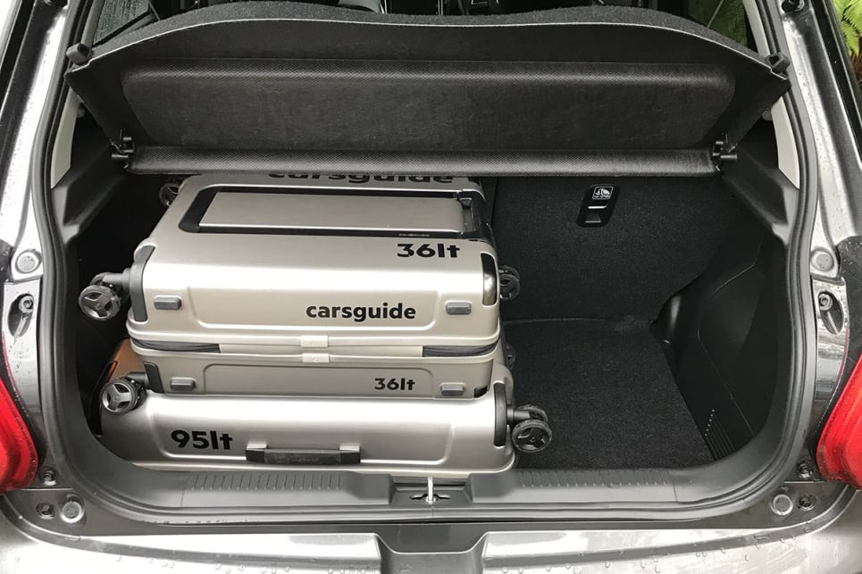 We could only squeeze in the small (36L) and medium (95L) suitcases from our three-piece test set without removing the cargo cover. (image: James Cleary)