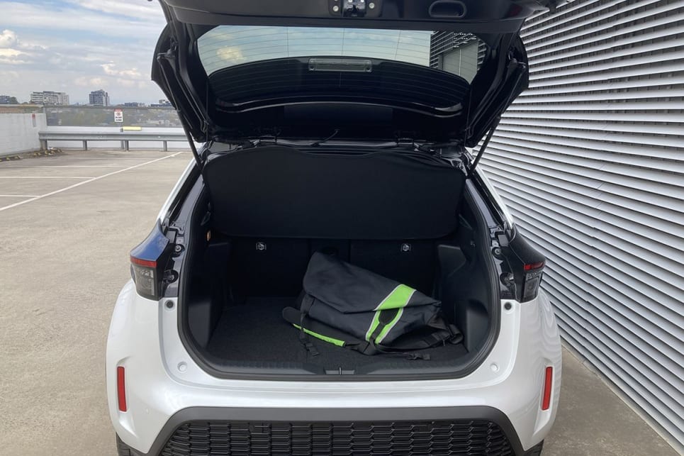 Moving to the luggage compartment, a flimsy, fiddly, foldable fabric mesh cover is your only defence from prying eyes. (image: Byron Mathioudakis)