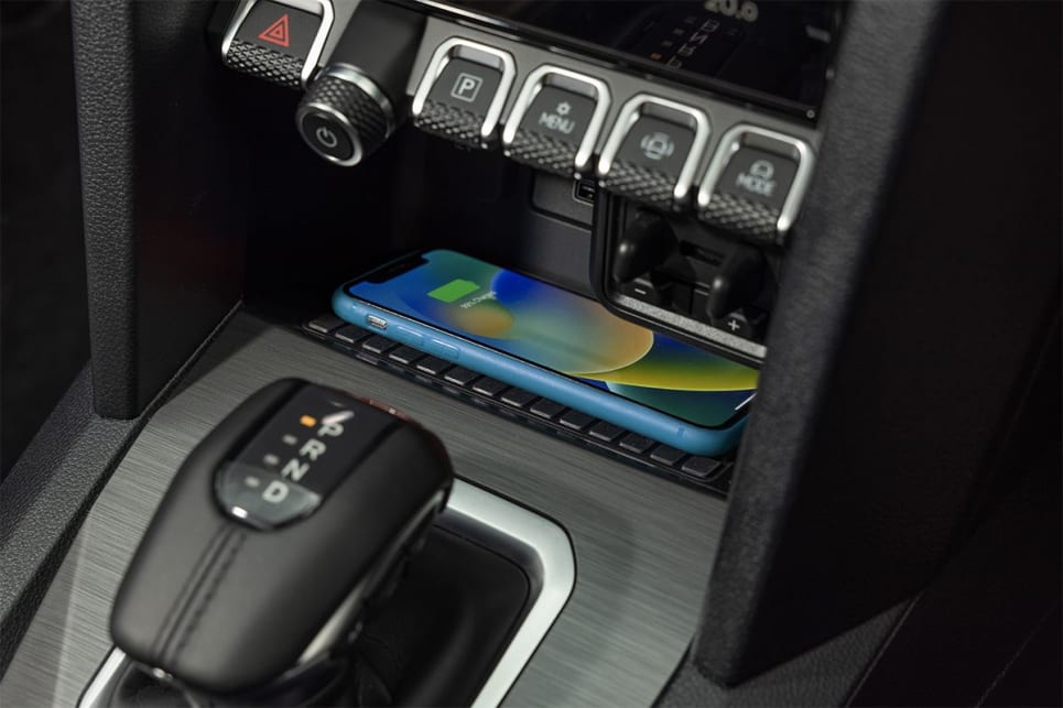 In front of the gear shifter is a wireless charging pad. (Adventura variant pictured)