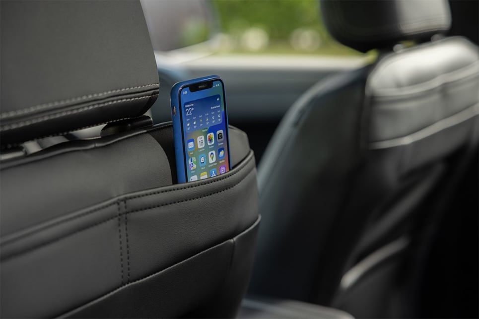 There's a sneaky phone pocket on the back of the front seats. (Adventura variant pictured)