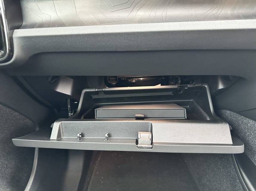The glove box is wide and deep but not tall, so it really only accommodates the driver’s manual. (image: Justin Hilliard)