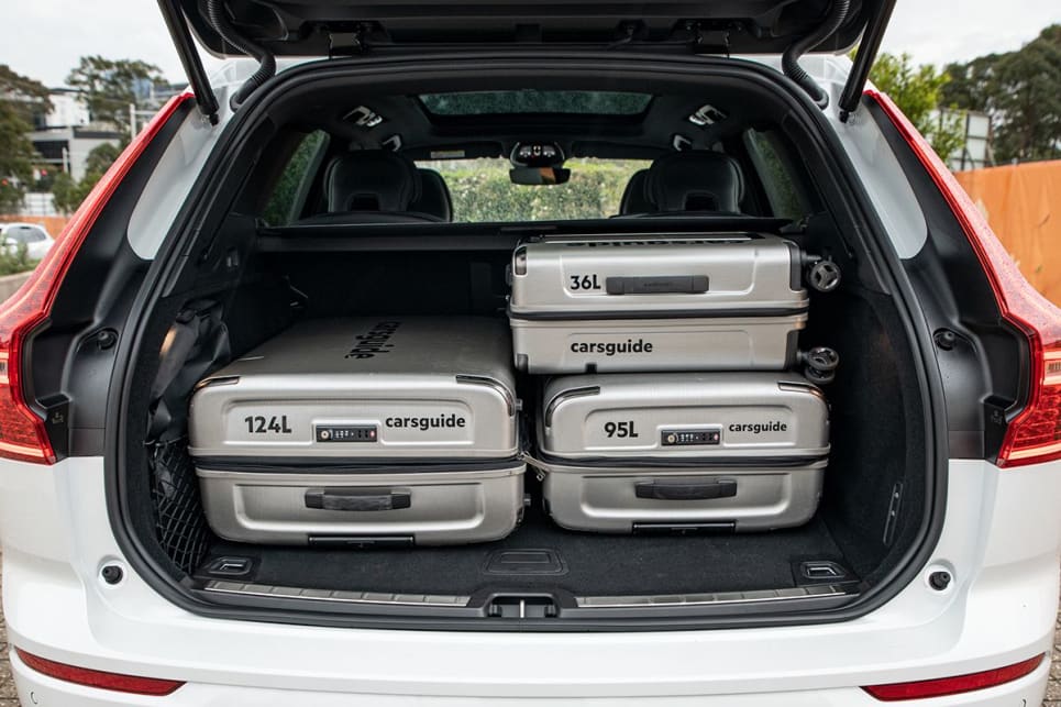 The XC60 easily fits the whole CarsGuide luggage set in the boot. (Image: Tom White)