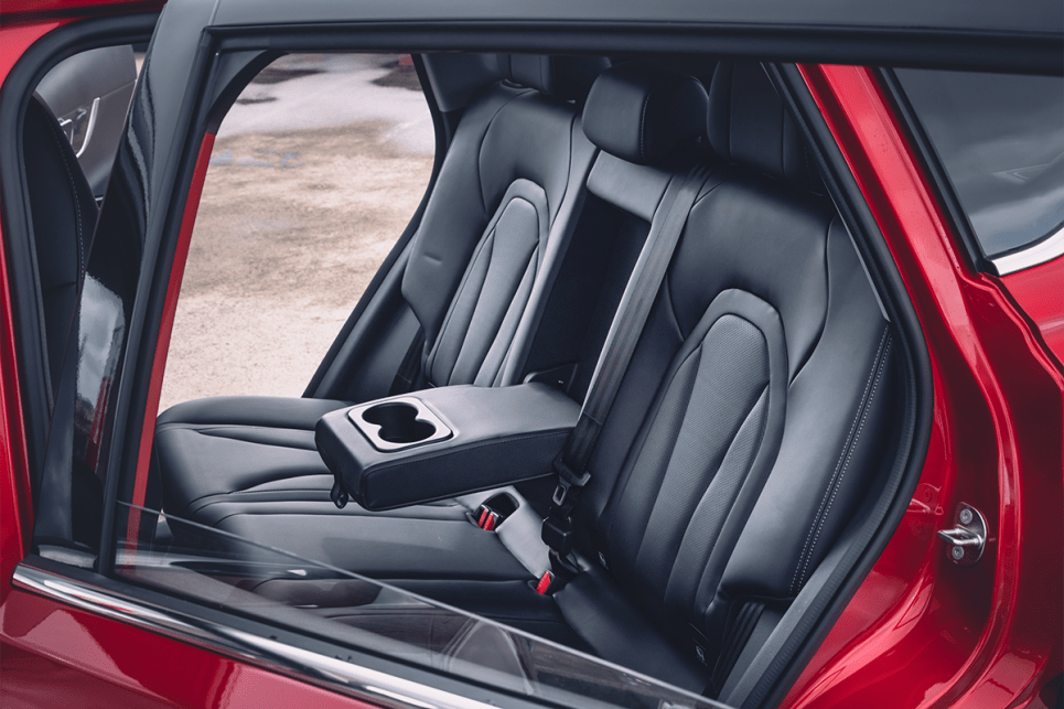 Rear storage options includes a pair of cupholders in the fold-down centre armrest.