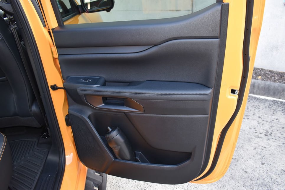 Rear seat passengers get small and large bottle holders and a bin in each door. (image: Mark Oastler)