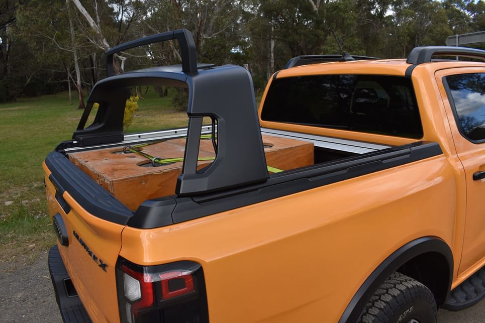 To carry longer items, another load-rack behind the rear window can easily slide rearwards on rails and be locked into place in a choice of five positions along the load tub. (image: Mark Oastler)