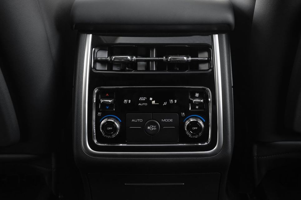 Middle row passengers have a separate climate-control zone with good old-fashioned knobs and toggles, as well as four vent outlets. (Ultra variant pictured)