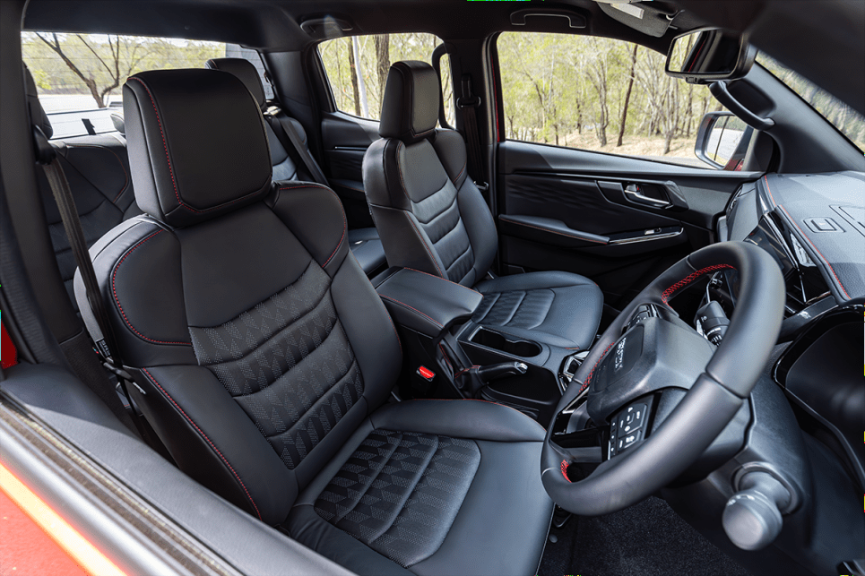 The X-Terrain features red stitching across its leather interior.
