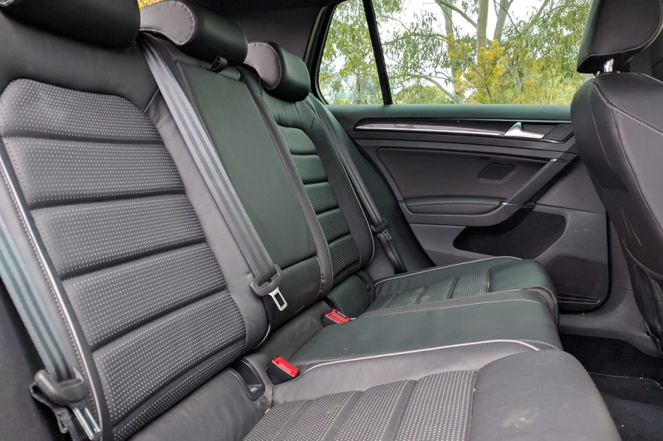 The back row is home to air vents, and two cupholders in the centre armrest. (image credit: Dan Pugh)