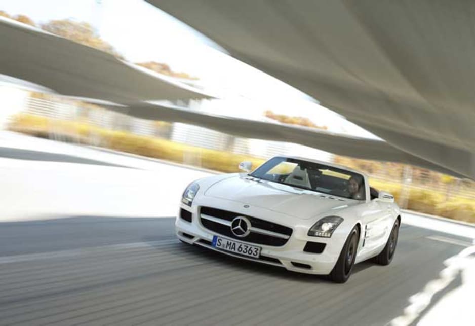 The Roadster is built on the coupe’s lightweight spaceframe chassis which mounts its 6.2-litre V8 low behind the front axle. New doors and additional chassis members front and rear to restore rigidity lost by removing the hardtop roof account for the 40kg weight increase over the 1620kg Coupe. The SLS’s 420kW V8 is one of the best sounding engines on the road today, a free-breathing technical highlight in a world fast succumbing to the efficiencies offered by turbochargers. And it’s matched by a brilliant seven-speed transmission that can change gears itself, or cede total control to you, though it can be a little slow to respond in manual mode.