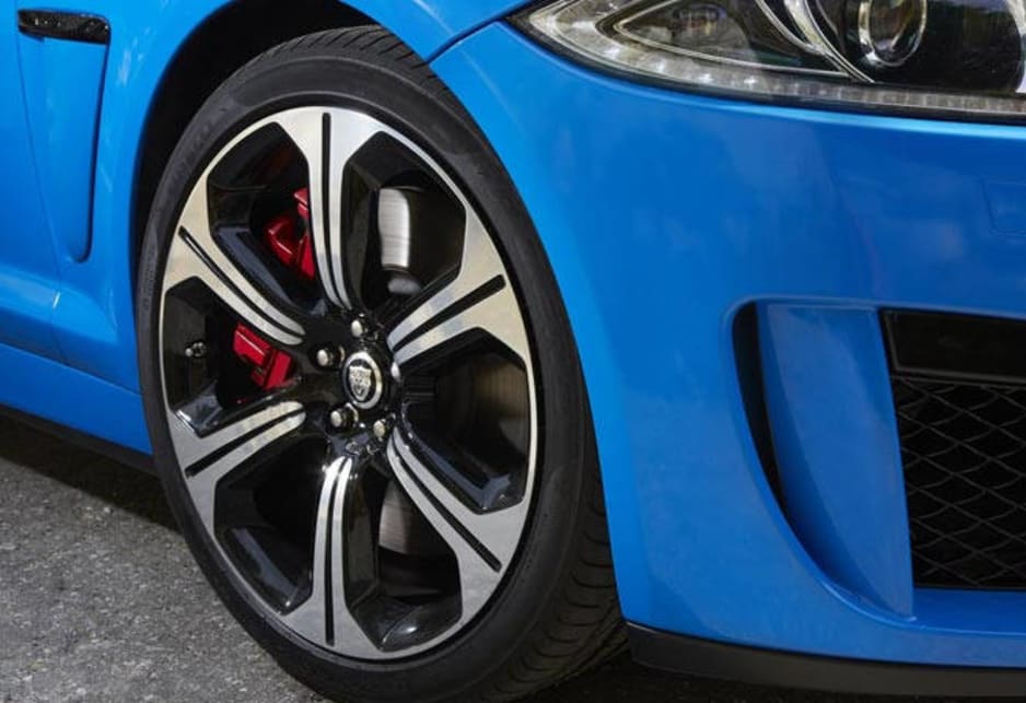 The XFR-S' 20-inch staggered wheels and 265/35R20 front, 295/30R20 Pirelli tires are wider rolling stock than the treads on the XFR.