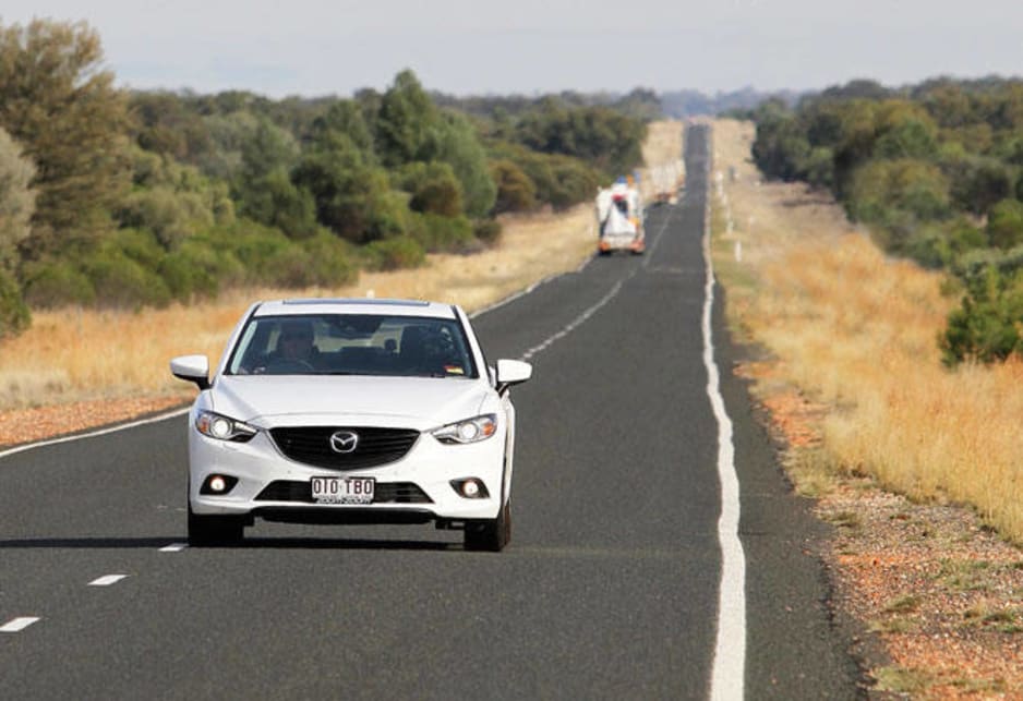 Mazda's passenger flagship completes the cross-country jaunt in good shape, cruising at the posted limits, averaging 6.6L/100km and needing no tyre changes.
