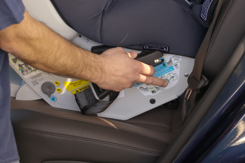 You'll find the ISOFIX straps either side of the seat.