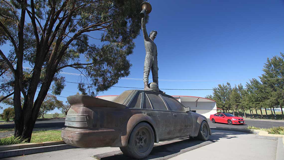 2015 VF Series II Holden Commodore SS-V Redline sedan with the Peter Brock memorial statue at Mount Panorama, Bathurst. Photo credit: Joshua Dowling