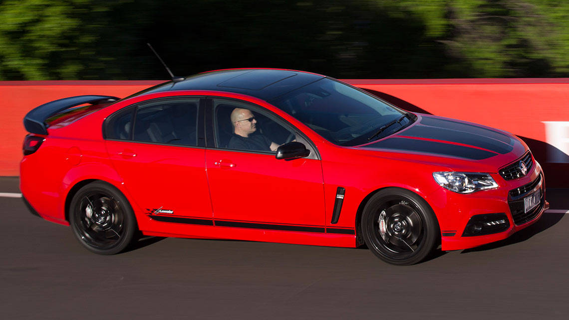 The limited edition Craig Lowndes SS V Special Edition Commodore being driven around Mount Panorama by Joshua Dowling.
